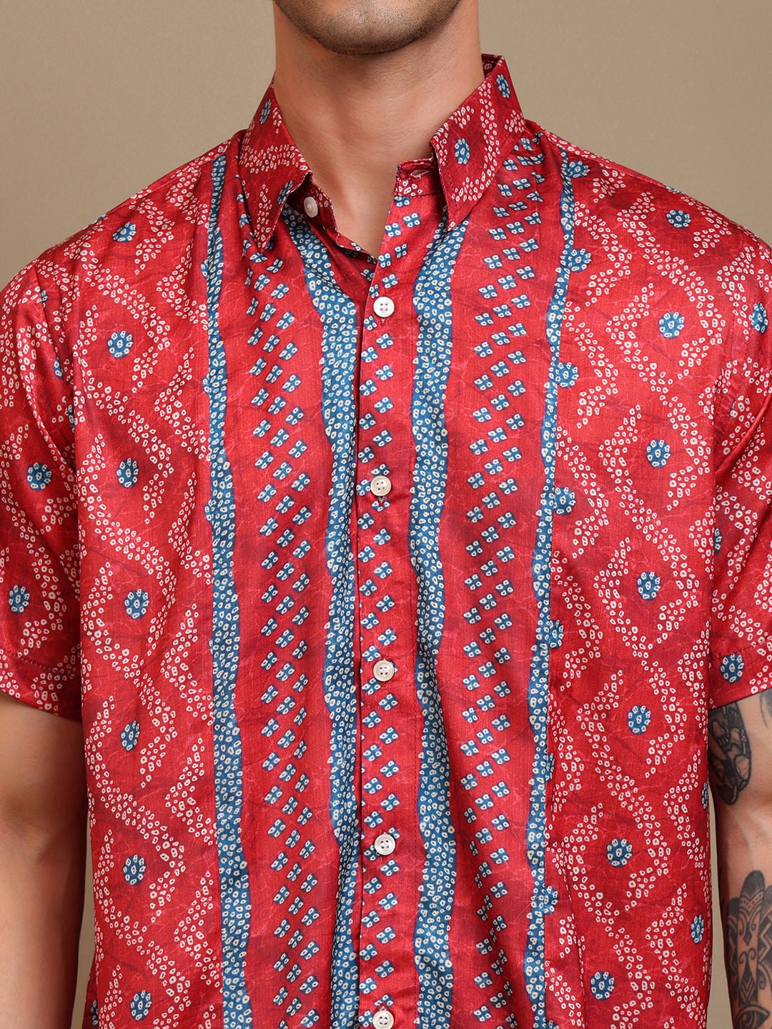 Close-up photo of red bandhni shirt