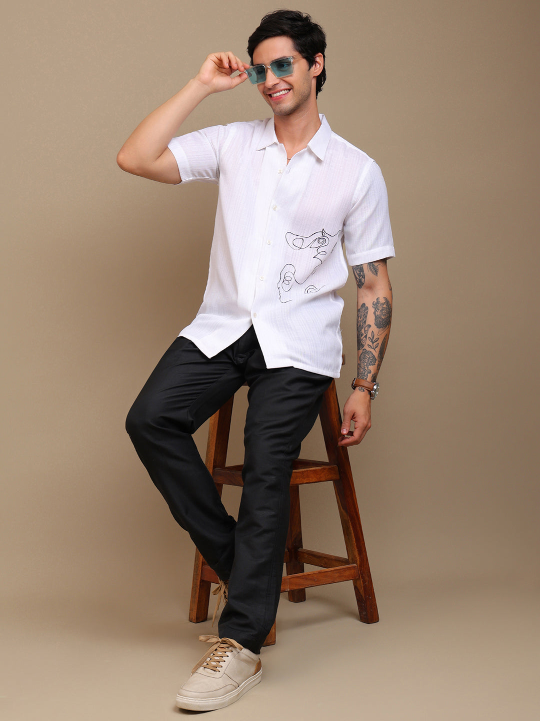 Artistic White Shirt with Unique Line Art Design
